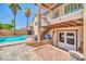 Backyard featuring a pool, patio area, balcony, and low-maintenance landscaping at 16805 S 29Th Pl, Phoenix, AZ 85048
