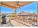 Balcony featuring a stainless steel grill and views of neighborhood houses at 16805 S 29Th Pl, Phoenix, AZ 85048