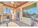 Balcony with ceiling fan offering views of a swimming pool, outdoor dining, and desert landscaping at 16805 S 29Th Pl, Phoenix, AZ 85048