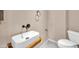 Modern powder room featuring stylish vessel sink, modern fixtures, and clean design elements at 16805 S 29Th Pl, Phoenix, AZ 85048