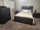 Bedroom featuring a queen bed, dresser, and nightstands at 16805 S 29Th Pl, Phoenix, AZ 85048