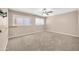 Bedroom featuring standard windows, ceiling fan, and plush carpeting provides space and relaxation at 16805 S 29Th Pl, Phoenix, AZ 85048