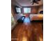 Bedroom with hard wood floors, ceiling fan and large windows at 16805 S 29Th Pl, Phoenix, AZ 85048