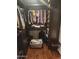 Walk-in closet with clothing racks, shelving, and ample storage space at 16805 S 29Th Pl, Phoenix, AZ 85048