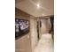 Hallway with recessed lighting and an elegant painting hanging on the wall at 16805 S 29Th Pl, Phoenix, AZ 85048