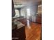 Kitchen featuring stainless steel appliances, granite countertops, and wooden flooring at 16805 S 29Th Pl, Phoenix, AZ 85048