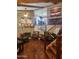 Living room with fireplace, hardwood floors, and comfortable seating at 16805 S 29Th Pl, Phoenix, AZ 85048