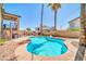 Private backyard oasis featuring a kidney-shaped pool, desert landscaping, and a patio area at 16805 S 29Th Pl, Phoenix, AZ 85048