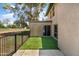 Enclosed backyard with artificial turf and access to community green space at 18206 N 45Th Ave, Glendale, AZ 85308