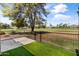 Private back patio with artificial turf overlooking community green space at 18206 N 45Th Ave, Glendale, AZ 85308