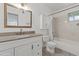 Updated bathroom with granite vanity top and shower-tub combo at 18206 N 45Th Ave, Glendale, AZ 85308