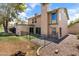 Exterior of home with fenced-in patio area and lush backyard views at 18206 N 45Th Ave, Glendale, AZ 85308