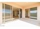 Covered patio with large sliding glass doors, providing lots of natural light at 1903 E Empeltre Rd, San Tan Valley, AZ 85140