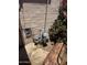 Home's exterior shows a gas meter, electrical connection, and vibrant bougainvillea near the foundation at 2030 N 21St Pl, Phoenix, AZ 85006
