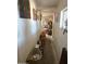 Image of an interior hallway cluttered with boxes and storage items at 2030 N 21St Pl, Phoenix, AZ 85006
