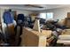 View of an interior room filled with boxes, clothes, and miscellaneous items at 2030 N 21St Pl, Phoenix, AZ 85006