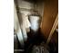 Showing the water heater and associated plumbing and storage at 2030 N 21St Pl, Phoenix, AZ 85006