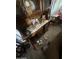 Close-up of a wooden china cabinet in a traditionally styled living room at 2102 W Hazelwood St, Phoenix, AZ 85015