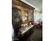Detailed view of a vintage wooden china cabinet adding charm to the living room at 2102 W Hazelwood St, Phoenix, AZ 85015