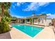 Backyard showcasing a swimming pool, covered patio, well-manicured landscaping, and outdoor space for entertaining at 2230 N Los Alamos --, Mesa, AZ 85213