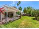 Beautiful backyard with lush greenery, a charming patio area, perfect for outdoor dining and relaxation at 2230 N Los Alamos --, Mesa, AZ 85213