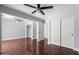Large bedroom with wood floors, ceiling fan, double closet, and ensuite bathroom at 2230 N Los Alamos --, Mesa, AZ 85213