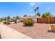 Well-kept home with desert landscaping featuring colorful bushes and a low-maintenance gravel yard at 2230 N Los Alamos --, Mesa, AZ 85213