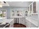 Well-lit kitchen featuring stainless steel appliances, ample cabinet space, and elegant marble countertops at 2230 N Los Alamos --, Mesa, AZ 85213