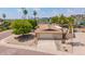 Aerial view of the home showcasing landscaping, roof, and proximity to pool at 2234 E Lawrence Rd, Phoenix, AZ 85016