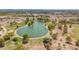 Picturesque aerial view of a lake with walking paths, trees, and greenery, offering a tranquil escape at 2234 E Lawrence Rd, Phoenix, AZ 85016