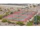 Well-maintained tennis courts with fencing and lighting, providing a great recreational amenity for residents at 2234 E Lawrence Rd, Phoenix, AZ 85016