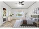 Tranquil bedroom with a backyard pool view, featuring stylish decor at 22737 N Sunset Dr, Maricopa, AZ 85139
