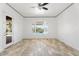 Bright bedroom featuring a large window with views of the backyard pool at 22737 N Sunset Dr, Maricopa, AZ 85139