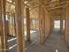 Interior view showcasing the framework and layout of the rooms in this home under construction at 2336 E Homesteader Rd, San Tan Valley, AZ 85140