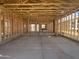 Unfinished interior features stud beams and concrete floor at 2336 E Homesteader Rd, San Tan Valley, AZ 85140