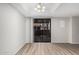 Open dining space with modern light fixture and sliding door leading to the patio at 234 N 75Th St # 209, Mesa, AZ 85207