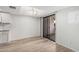 Open dining area situated between the kitchen and patio, with modern flooring at 234 N 75Th St # 209, Mesa, AZ 85207