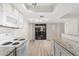 Bright kitchen features white appliances and granite countertops and is open to the living area at 234 N 75Th St # 209, Mesa, AZ 85207