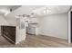 Bright kitchen features white appliances, a wood-clad breakfast bar, and lovely granite countertops at 234 N 75Th St # 209, Mesa, AZ 85207