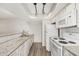 Bright kitchen features white appliances and granite countertops at 234 N 75Th St # 209, Mesa, AZ 85207
