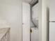 Convenient laundry area with stackable washer and dryer, adjacent to kitchen with granite countertops at 234 N 75Th St # 209, Mesa, AZ 85207