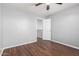 Bedroom with hardwood floors and a neutral wall color ready to be personalized at 24813 W Rosita Ave, Buckeye, AZ 85326