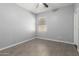 Bedroom with a ceiling fan and light gray walls at 24813 W Rosita Ave, Buckeye, AZ 85326