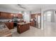 Large kitchen boasts an island, updated appliances, and access to the living space at 24813 W Rosita Ave, Buckeye, AZ 85326