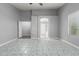 Spacious main bedroom with a ceiling fan, large window, and access to bathroom and closet at 24813 W Rosita Ave, Buckeye, AZ 85326