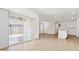 Living area with wood-look floors, recessed lighting, and sliding glass doors at 25165 N 183Rd Dr, Wittmann, AZ 85361