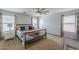 A spacious bedroom with large windows, lots of natural light, and neutral walls at 25930 N 165Th Ln, Surprise, AZ 85387