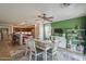 This dining room is adjacent to the kitchen and living areas, creating a spacious flow at 25930 N 165Th Ln, Surprise, AZ 85387