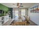 Bright dining room with open access to backyard patio, lots of natural light, neutral walls at 25930 N 165Th Ln, Surprise, AZ 85387