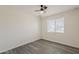 Bedroom features modern ceiling fan, neutral paint and floors and a window providing natural light at 3202 W Glenrosa Ave, Phoenix, AZ 85017